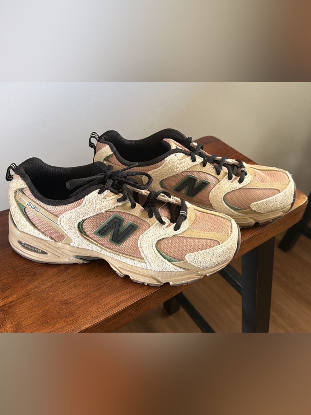New Balance Beige and Black Accent Sneakers
